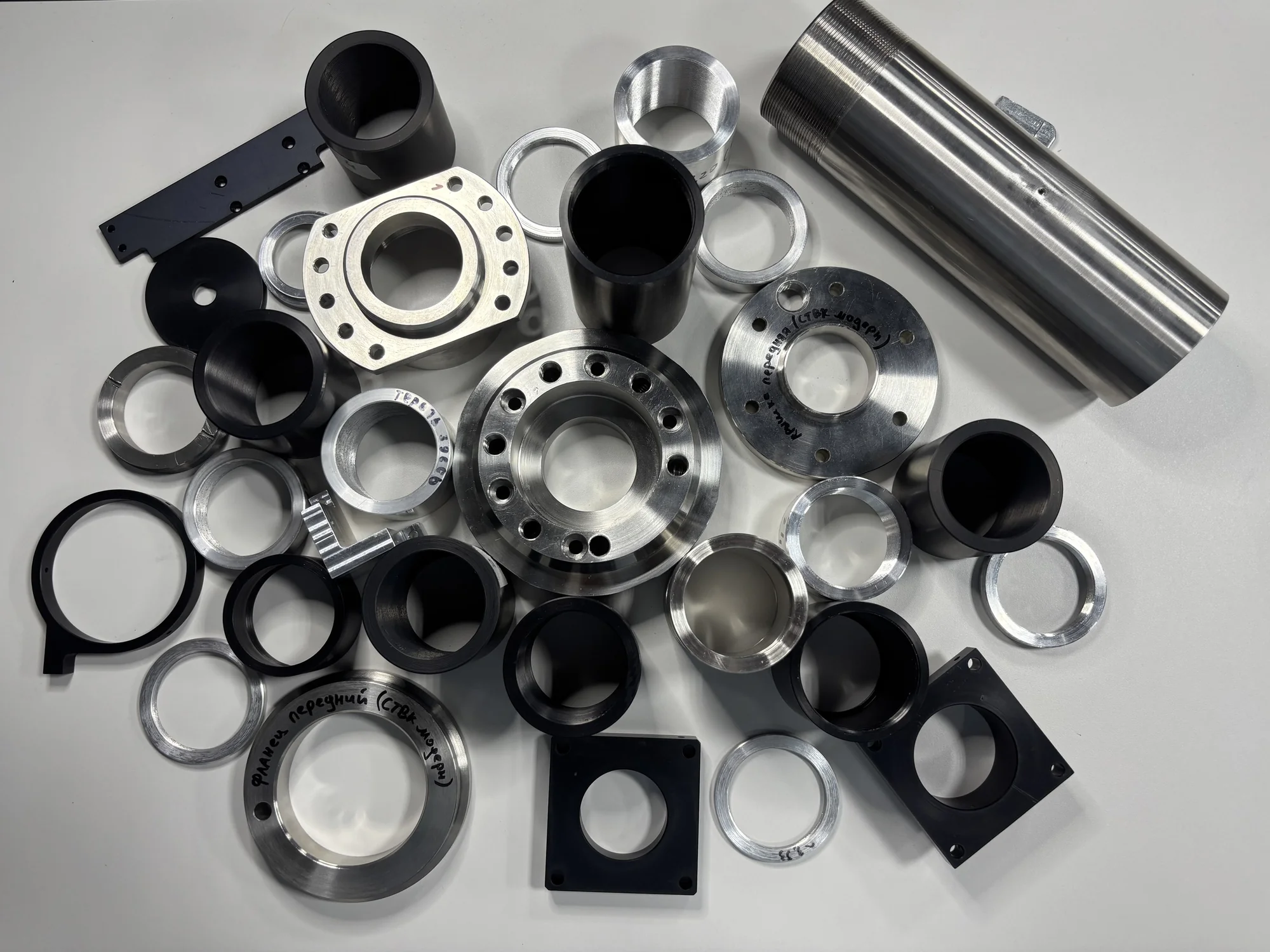 Manufactured metal flanges, bushings, rings and borescope housing parts