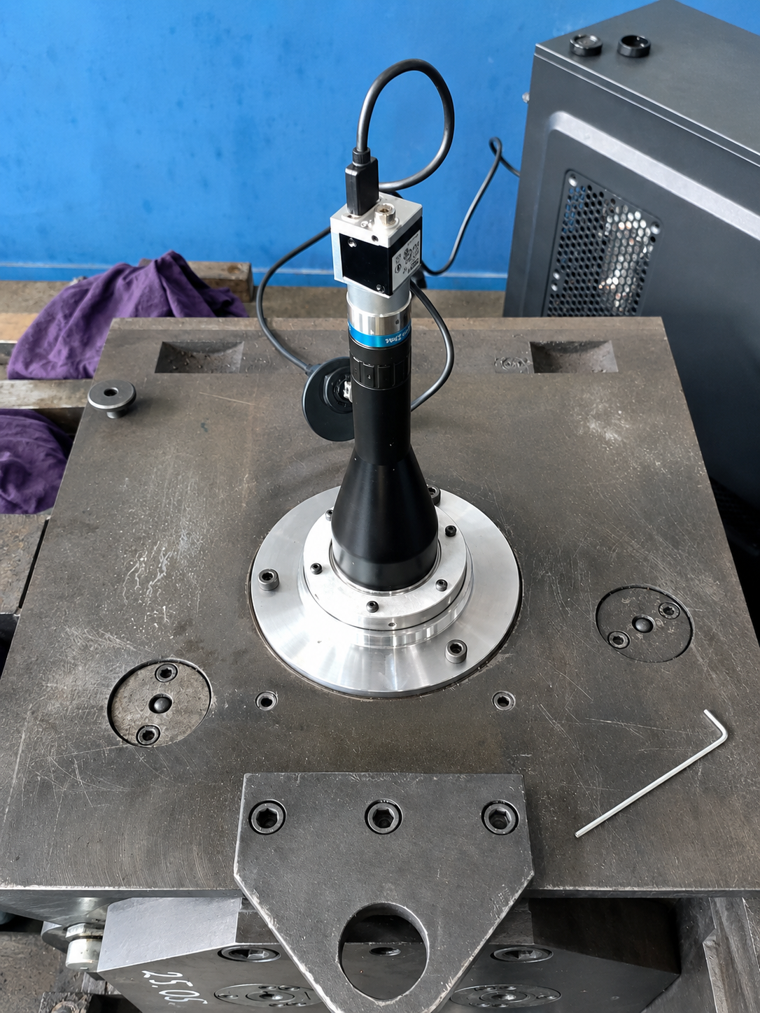 Optoelectronic instrument installed on a rolling stand in a factory