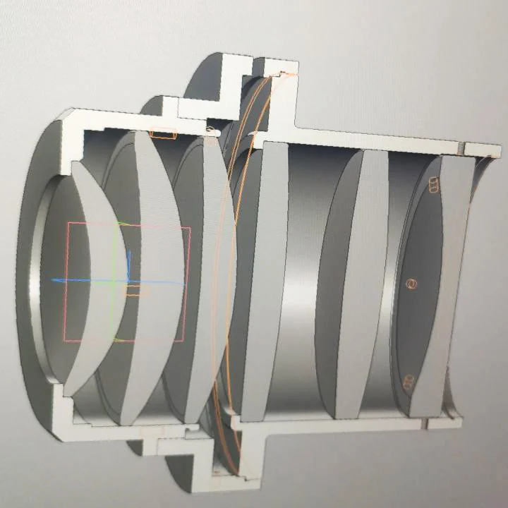 Cross-sectional optical model showing the lenses and ray paths